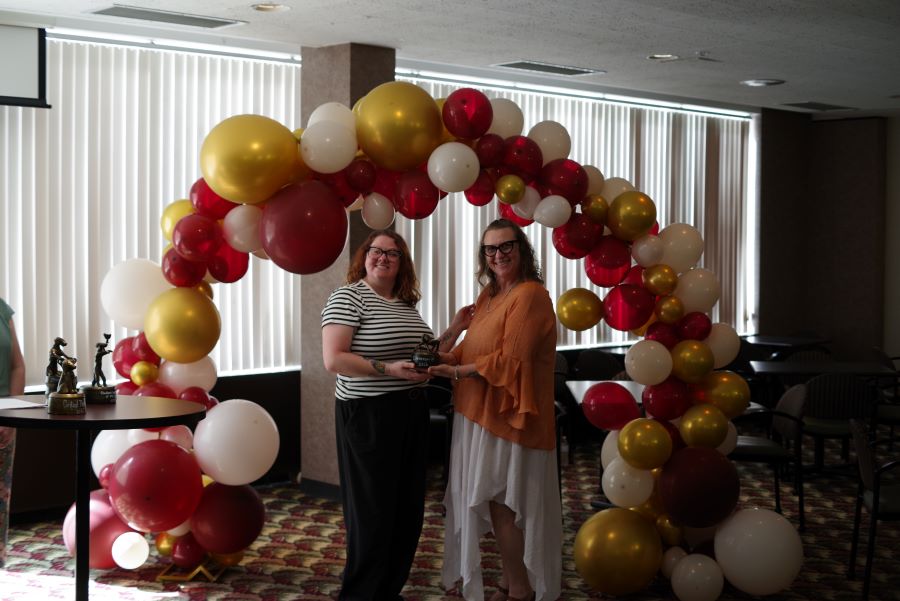 2026 Critical Thinking Award presented to Devin Snoddy by Career Development Director Jaime Conley